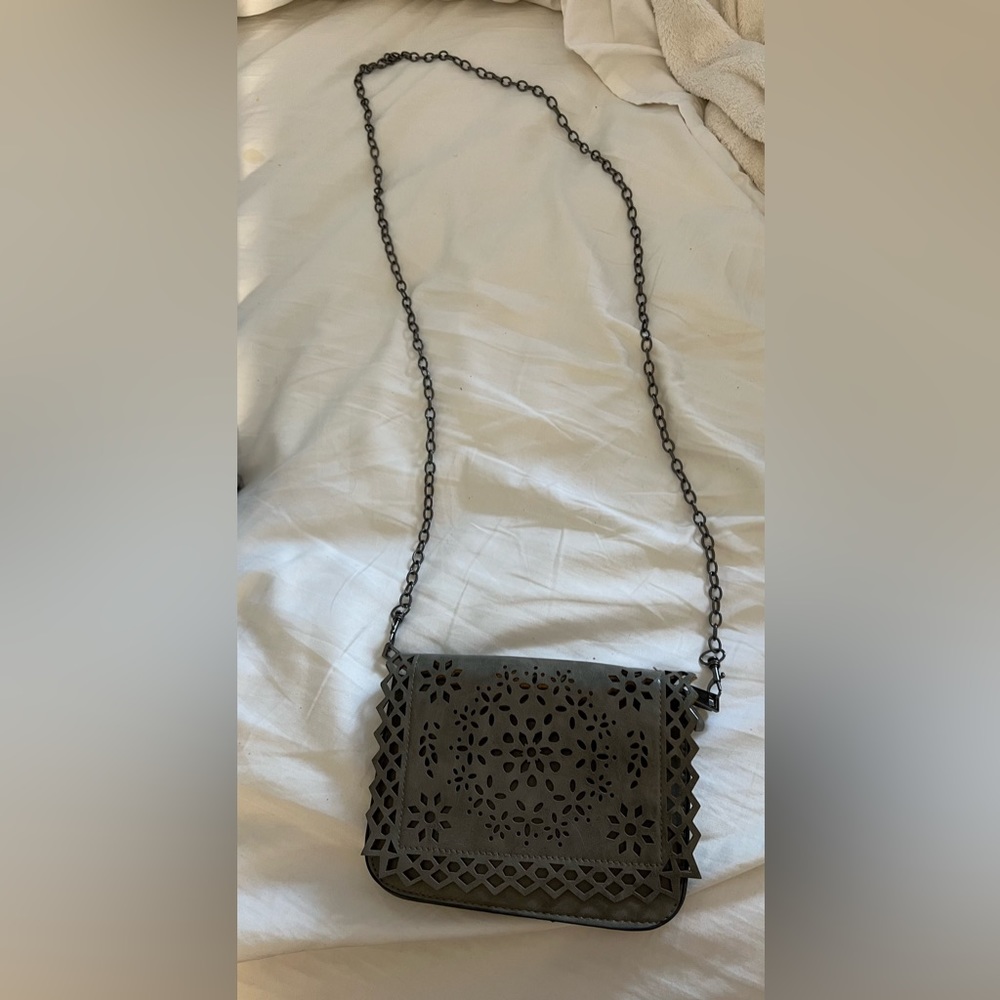 Bohemian Style Leather Crossbody Bag with Ornate Decor